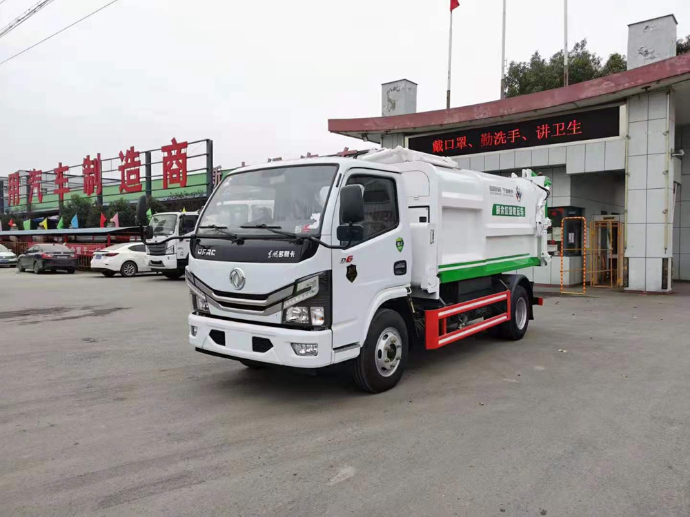 國六7立方多利卡D6右側掛桶垃圾車(chē)
